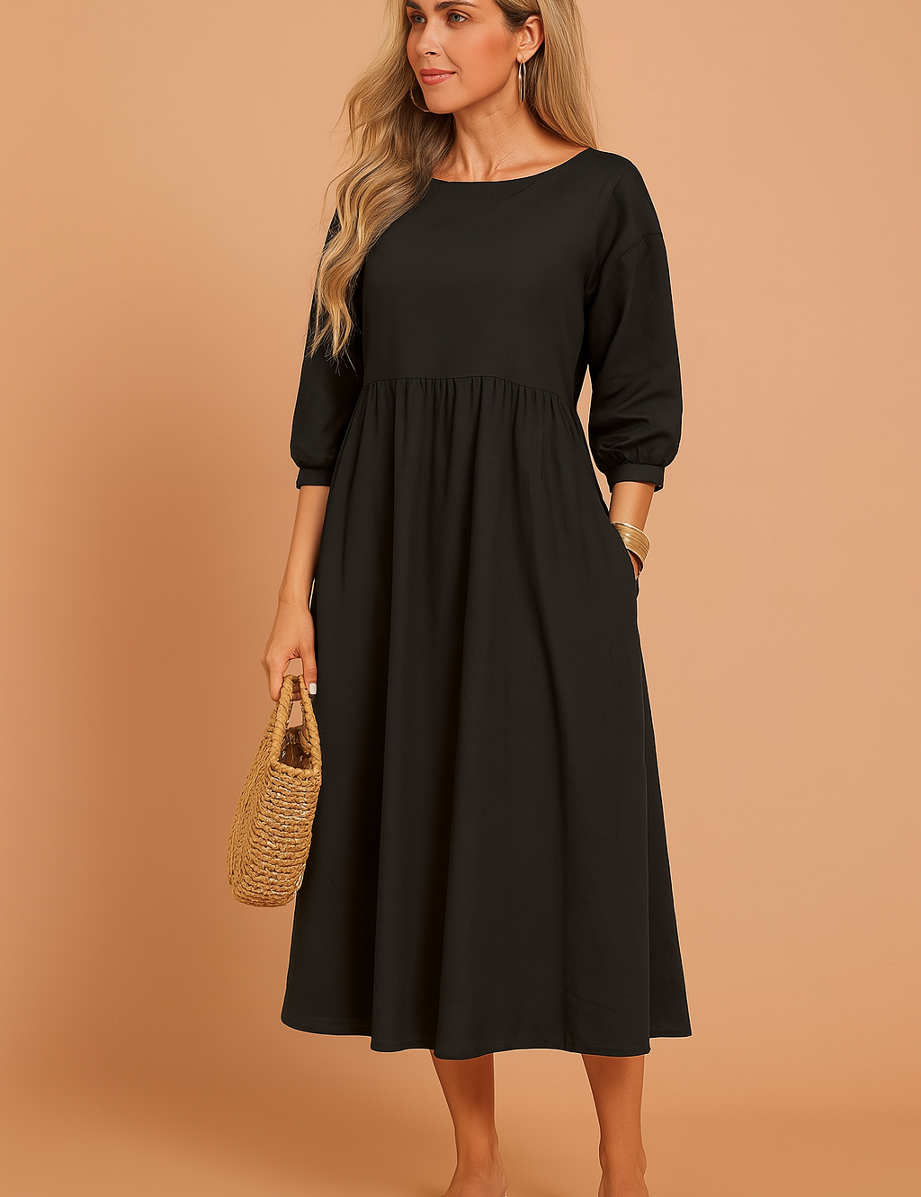 midi dress featuring three-quarter puff sleeves, a high gathered waistline, and a relaxed A-line silhouette
