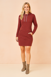 Burgundy hoodie dress with long sleeves, drawstring neckline, and angled front pockets, paired with taupe suede ankle boots.
