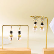 CrystalChill | Lśniące kolczyki w kształcie płatków śniegu jako świąteczny prezent 1