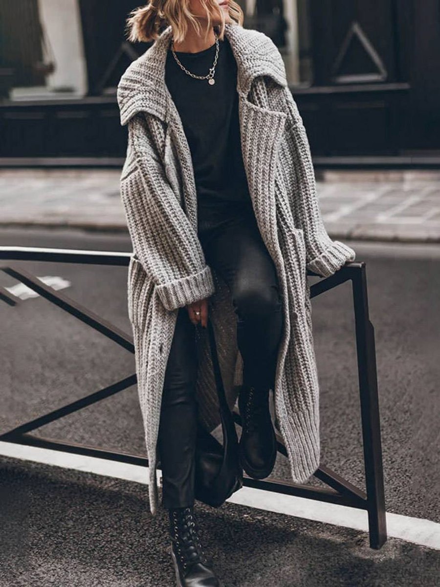 Damski sweter oversize z długim krojem i guzikami na jesień i zimę 0