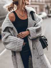 Damski sweter oversize z długim krojem i guzikami na jesień i zimę 3