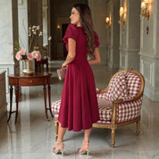 Elegancka sukienka midi z kopertowym dekoltem i bufkami na lato 7