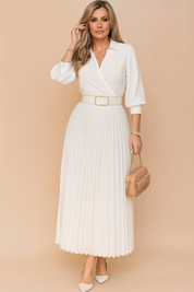 A stylish white midi dress featuring a wrap-style top, three-quarter sleeves, a wide belt with a gold buckle, and a flowy pleated skirt