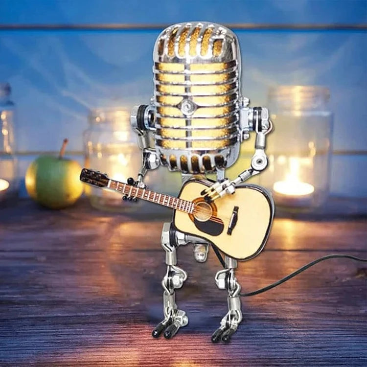 Metalowy robot z mikrofonem i lampą gitarową 1