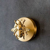 Mosiężny wieszak ścienny w kształcie zwierzęcia ze złotymi akcentami 4