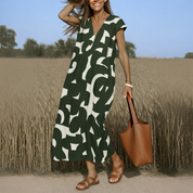 Sukienka z dekoltem w kształcie litery V i lejącym nadrukiem - elegancka i przewiewna 0