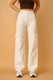 High-waisted beige cargo pants with wide-leg cut, clean seam detailing, and dual flap pockets on each thigh, styled with white sneakers.