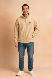 Beige fleece zip-up jacket with elastic cuffs, full-length zipper, side pockets, and a small embroidered logo patch on the chest, maintaining a soft, cozy fabric texture identical to the original.