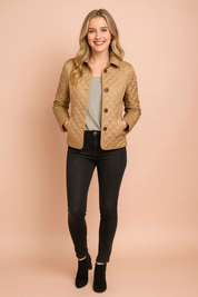 Beige quilted button-down jacket with diamond pattern stitching, front pockets, and classic collar, styled for a modern winter look.