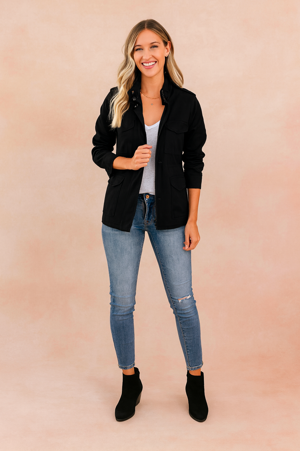 Black casual zipper jacket with long sleeves, flap chest pockets, button details, and a straight cut, styled with a white T-shirt and denim jeans.