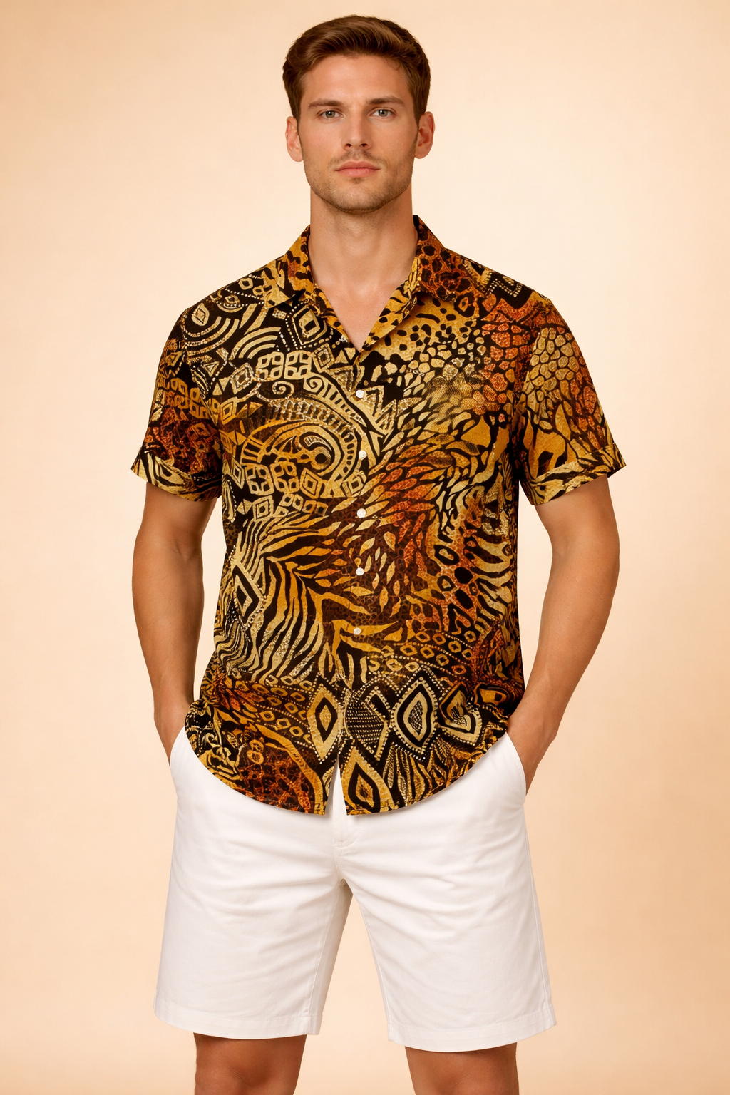 Black short-sleeve button-up shirt with an all-over gold paisley and floral medallion pattern, featuring a classic collar and front button closure, paired with light beige linen shorts with a tailored straight-leg cut and clean hem.