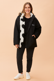 Women’s winter parka jacket with soft fleece heart-print lining, full front zipper, side pockets, and casual streetwear style for warmth and comfort.