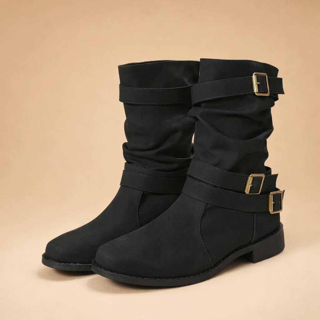 black-slouchy-ankle-boots-model-studio-pose-european-fashion-editoria.png