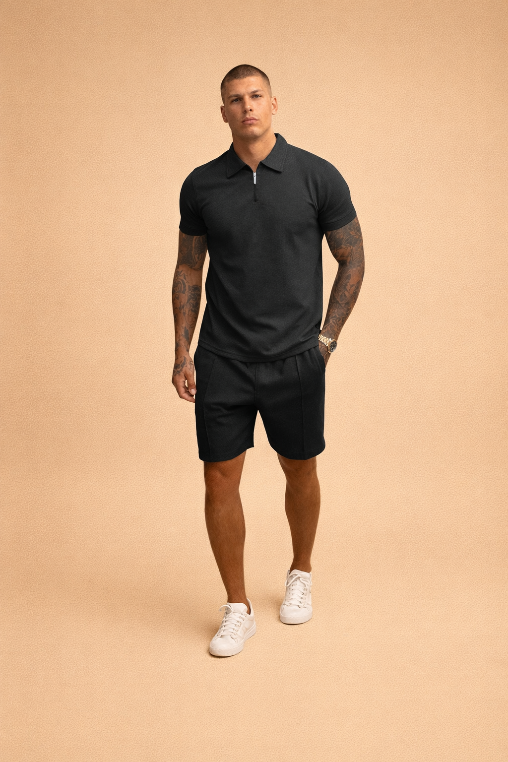 Black short-sleeve zip polo shirt with a smooth solid weave, paired with matching tailored black shorts featuring a clean structured finish, styled with white low-top minimalist sneakers for a modern refined casual look.