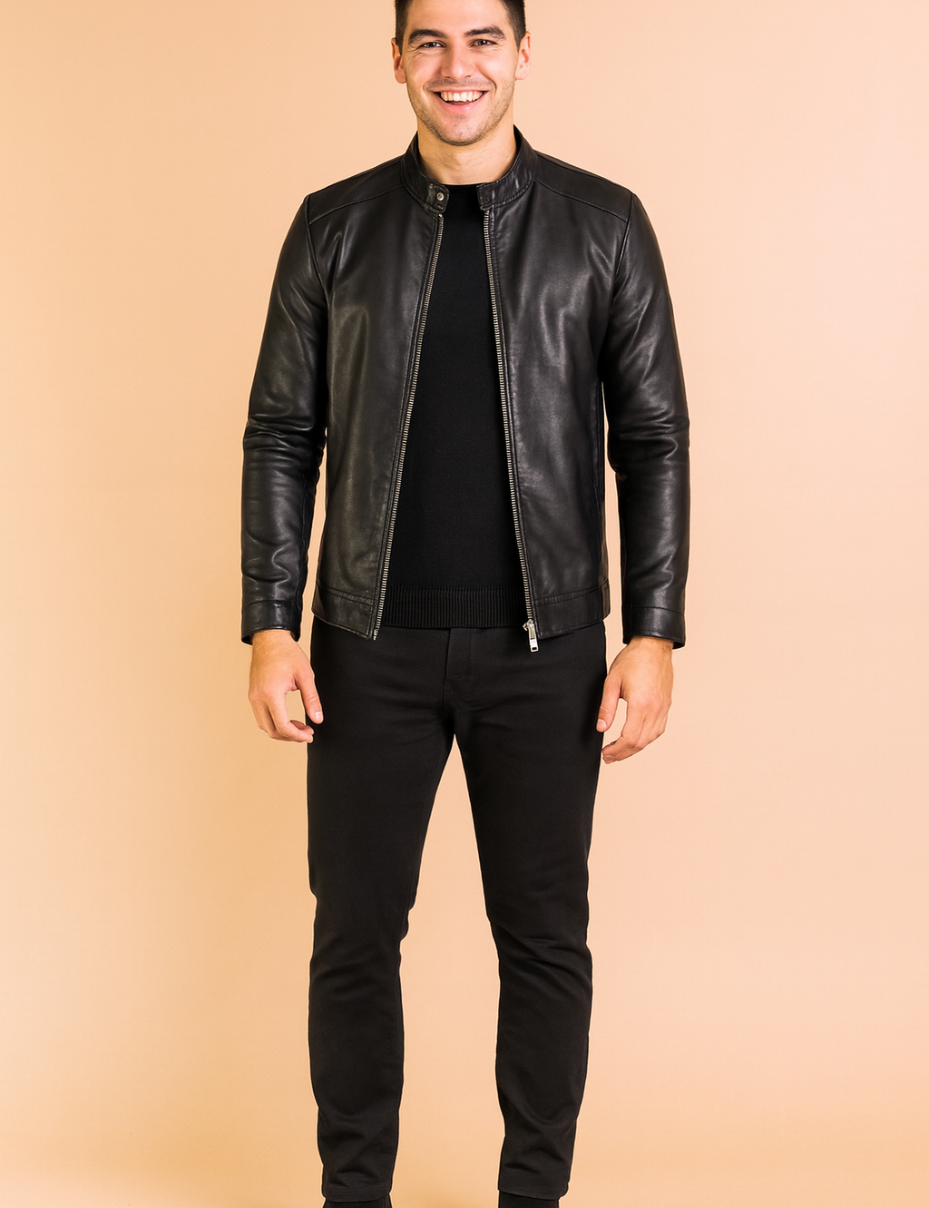 Slim-fit black leather jacket with zipper closure and stand-up collar, styled with a clean black inner layer for a sleek and modern look.