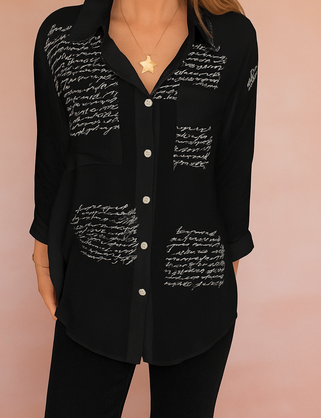 Light blue button-down shirt with black handwritten script print, featuring front buttons, long sleeves, and a chest pocket; elegant casualwear with artistic calligraphy pattern for a modern statement look.