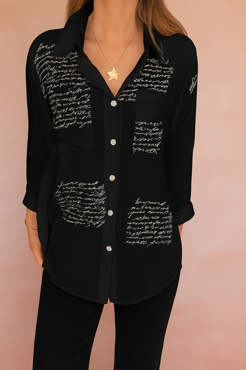Light blue button-down shirt with black handwritten script print, featuring front buttons, long sleeves, and a chest pocket; elegant casualwear with artistic calligraphy pattern for a modern statement look.