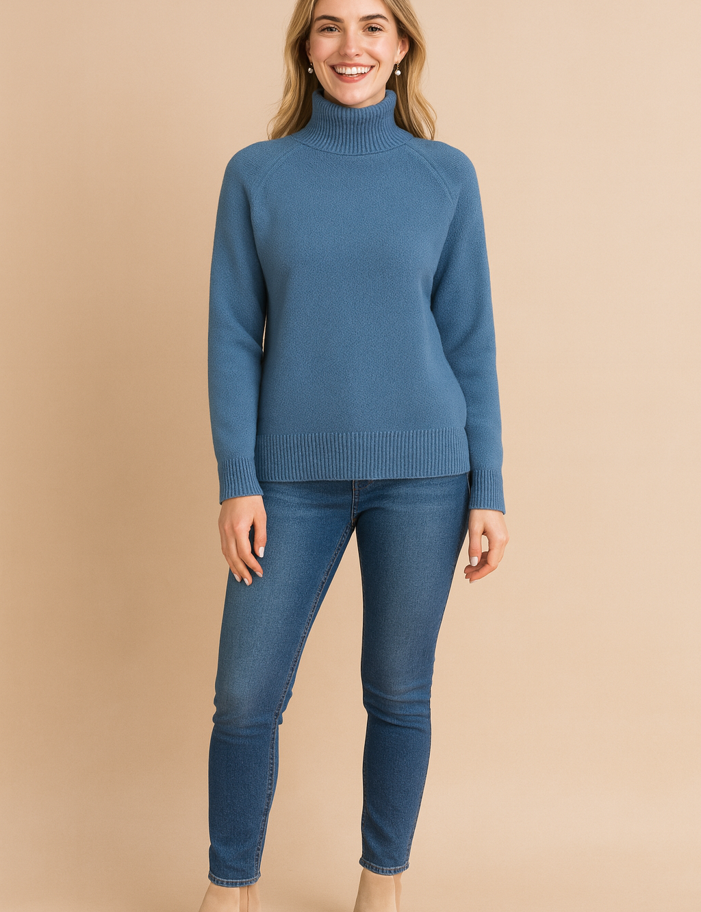 Blue high-neck ribbed knit sweater paired with slim-fit blue jeans and beige ankle boots, designed for a cozy and stylish casual look.