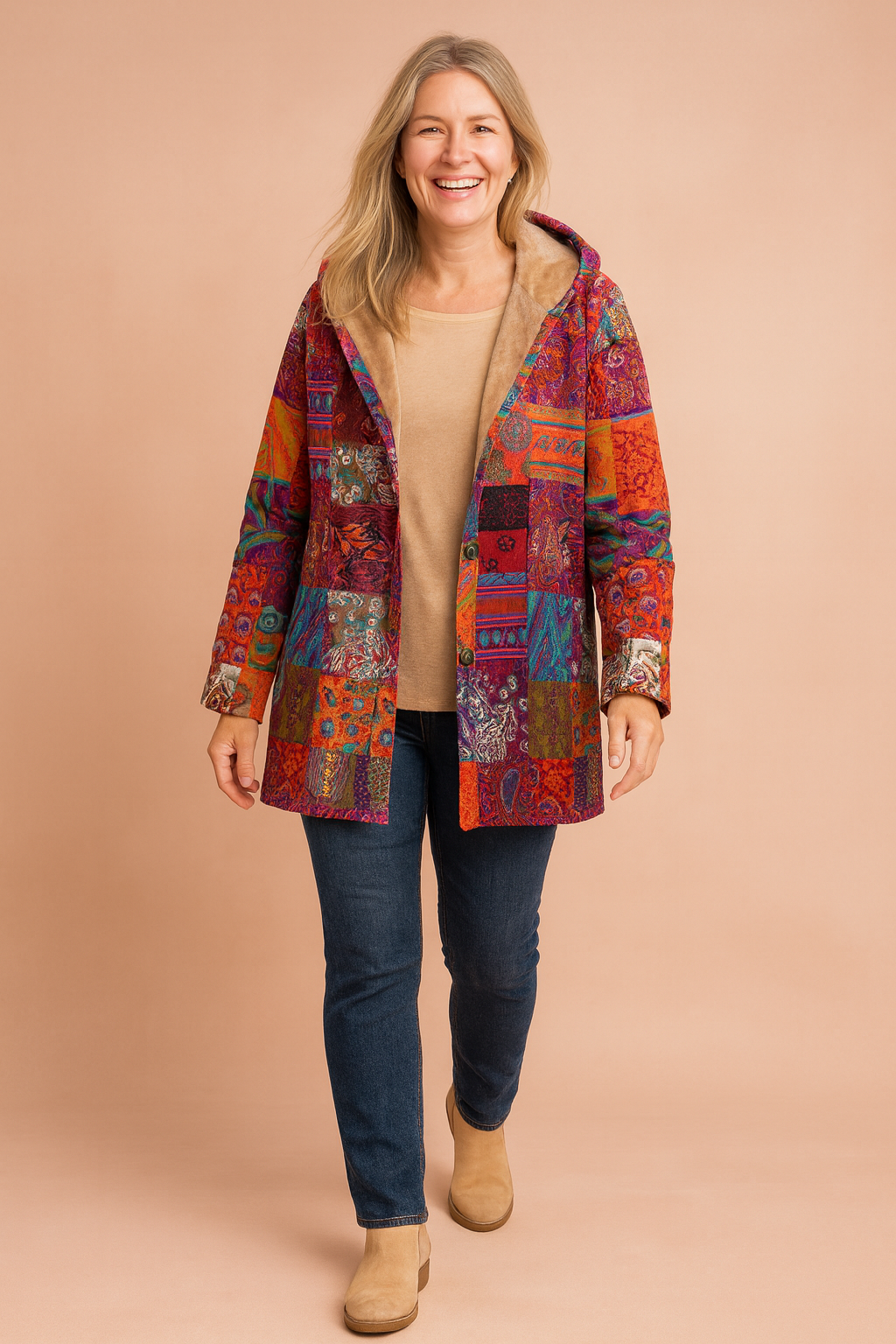 Bohemian patchwork fleece-lined hooded coat in multicolor tribal and paisley print, featuring rich velvet textures, vivid color blocks in red, orange, turquoise, and violet, with a warm tan faux fur lining.