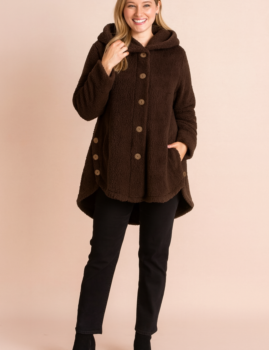 Brown fleece hooded button-up jacket with front pockets, designed for women. Features a mid-thigh length, long sleeves, and cozy sherpa-style fabric for warmth and comfort