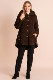 Brown fleece hooded button-up jacket with front pockets, designed for women. Features a mid-thigh length, long sleeves, and cozy sherpa-style fabric for warmth and comfort