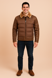 Brown padded bomber jacket with distressed leather sleeves and faux fur collar, featuring quilted front panels, zip closure, and side pockets for a stylish winter look.