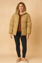 Brown unisex puffer jacket with hood, front zipper closure, side pockets, and elastic cuffs, designed for winter warmth and comfort