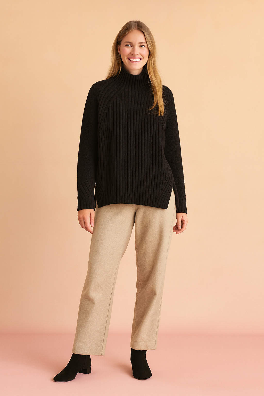 Black ribbed turtleneck sweater paired with beige straight-leg trousers and black ankle boots.