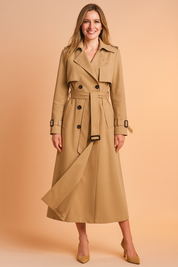 Classic full-length camel trench coat with double-breasted button closure, wide lapels, belted waist, buckle cuffs, and side pockets, paired with matching suede pointed-toe heels.