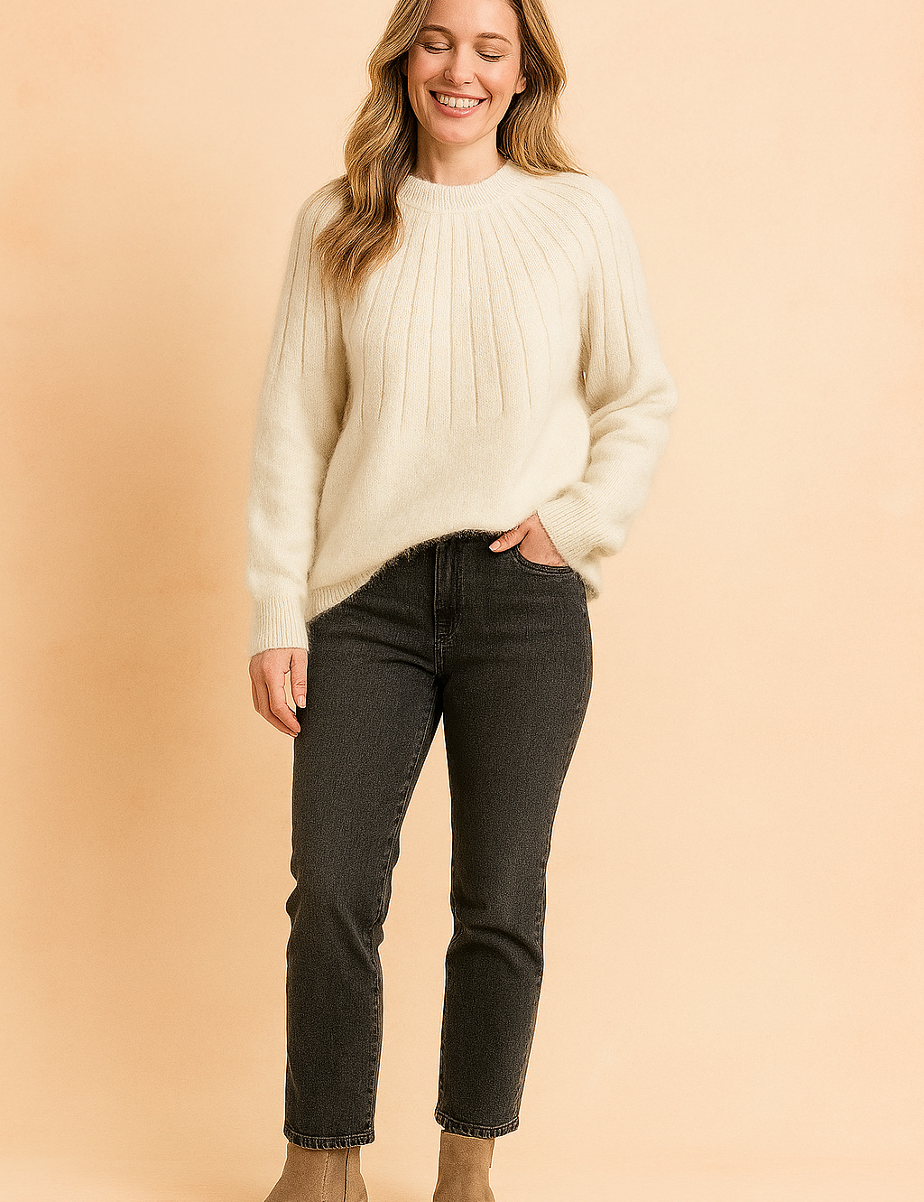 Cream ribbed knit sweater with a soft, fuzzy texture, paired with high-waisted charcoal jeans and taupe suede ankle boots.