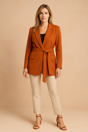 Women's terracotta blazer dress with a belt at the waist, fashionable and elegant with classic lapels.