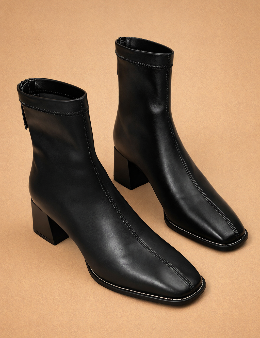 elegant-black-ankle-boots-studio-model-style-european-fashion-editorial.png