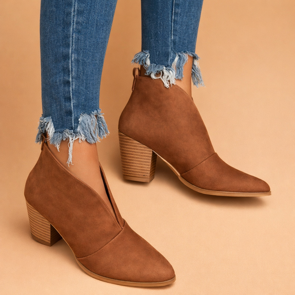 elegant-brown-ankle-boots-frayed-denim-model-studio-shot-luxury-fashion.png