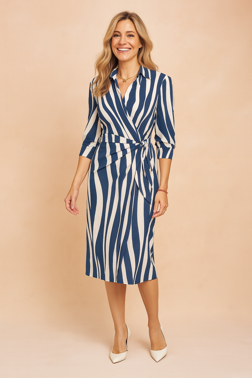 Wrap-style midi dress featuring bold navy and white abstract vertical stripes, a collared neckline, three-quarter sleeves, and a side waist tie detail, tailored for a flattering silhouette.