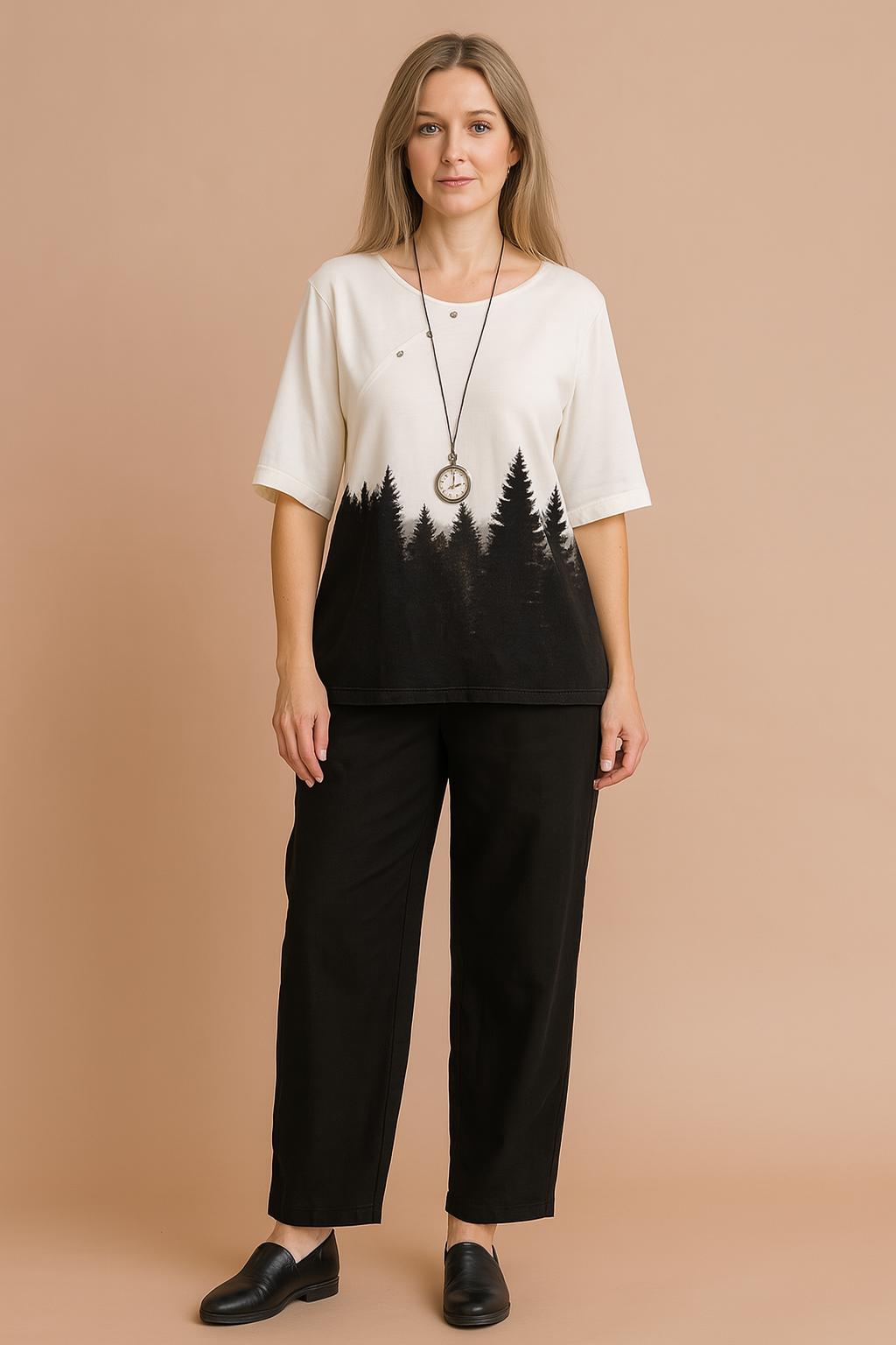  Two-piece forest-print casual outfit featuring a white half-sleeve top with black pine tree silhouette design and relaxed black ankle-length pants, styled with a vintage pendant necklace.