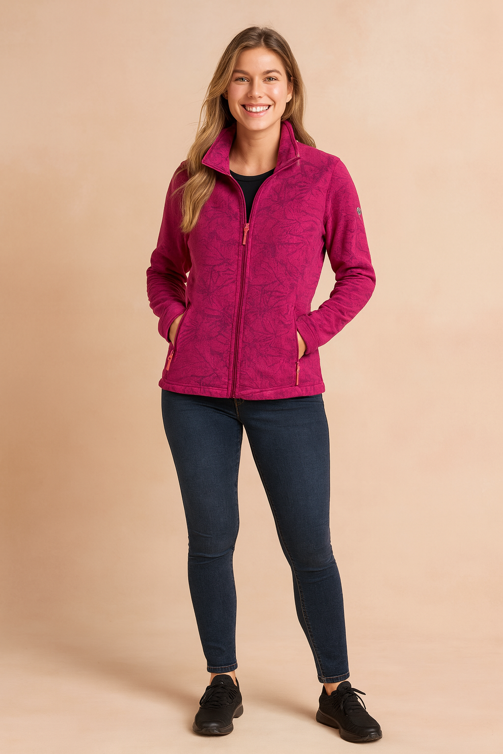 Fuchsia fleece jacket with subtle leaf patterns, full zip front, high collar, and zippered side pockets, styled for casual wear.