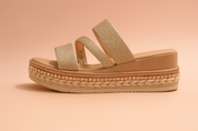 Gold glitter platform sandals with triple sparkle straps, perforated padded insole, metallic rose gold studded midsole, and braided rope detail on the sole.