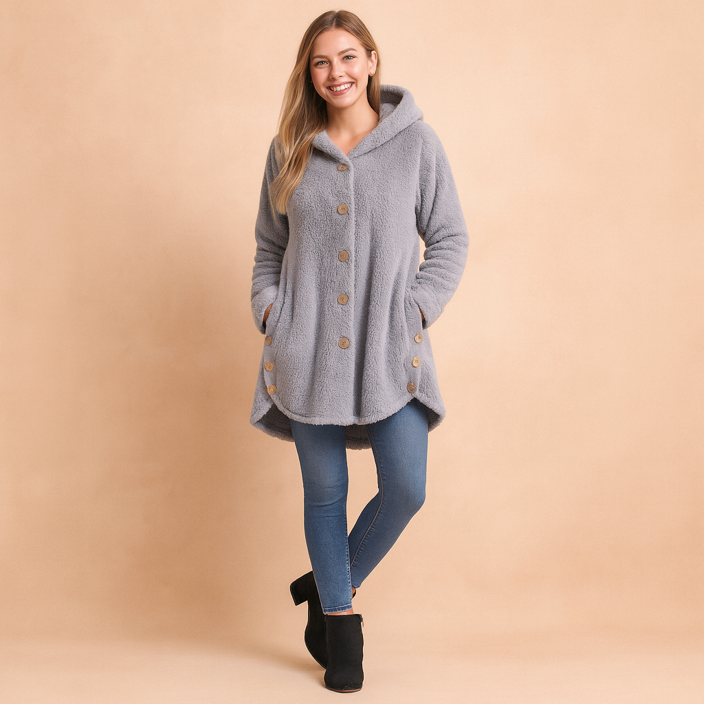 Gray fleece hooded button-up jacket with front pockets, designed for women. Features a mid-thigh length, long sleeves, and cozy sherpa-style fabric for warmth and comfort