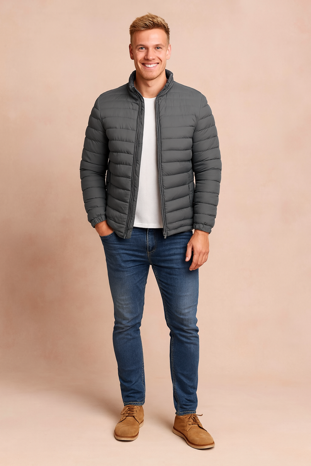 Gray quilted puffer jacket with zip closure, elastic cuffs, and side pockets styled for a modern casual look.