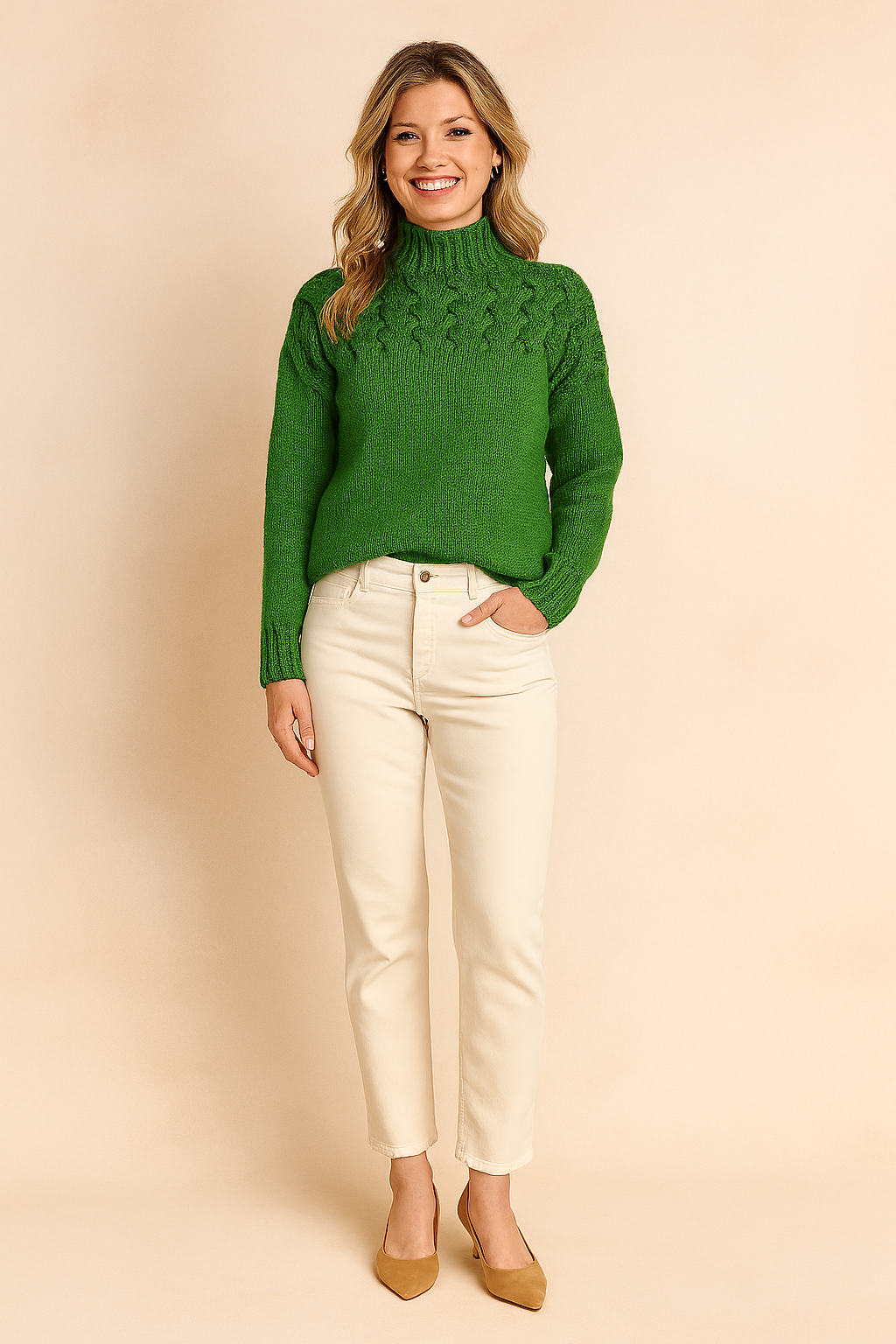 Green cable-knit high-neck sweater paired with cream high-waisted straight-leg pants and tan suede pumps.