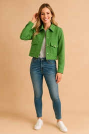 Stylish cropped green button-up jacket with front flap pockets, classic collar, and long sleeves for a modern casual look.
