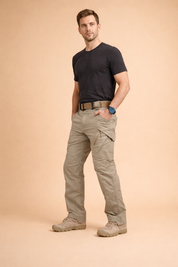 Khaki tactical cargo pants with reinforced seams, multi-utility side pockets, straight-leg cut, and structured fit, paired with rugged lace-up outdoor boots for a functional utility look.
