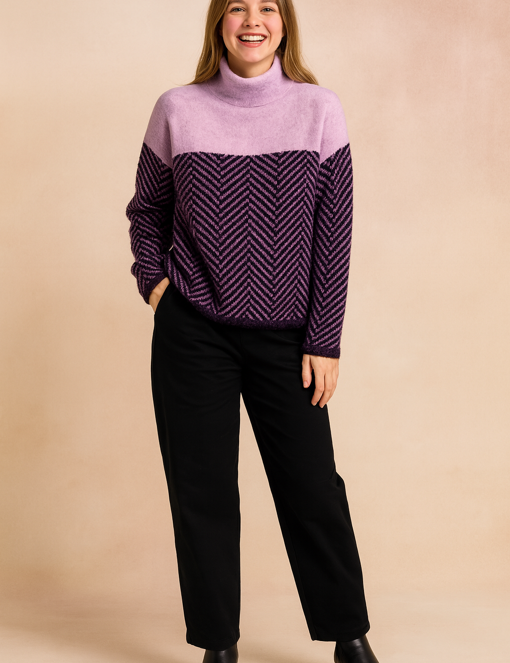 Two-tone knit sweater with a soft pastel lavender upper and a deep purple herringbone-patterned lower section, designed with a relaxed fit, long sleeves, and a cozy high neckline, paired with classic black trousers and ankle boots.