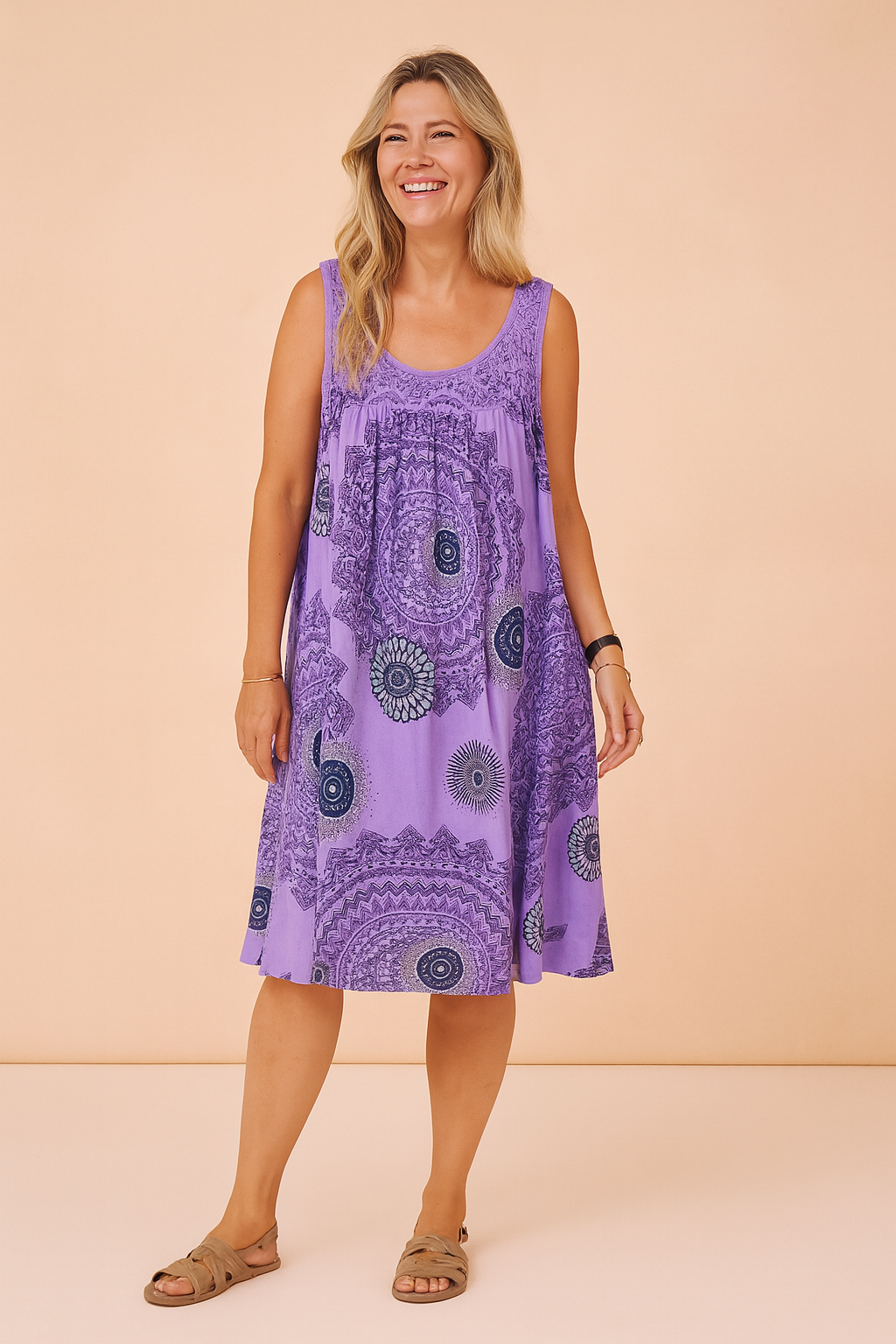 Sleeveless lavender sundress with intricate mandala print and crochet lace neckline, featuring a flared silhouette and knee-length hem.