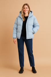 Light blue unisex puffer jacket with hood, front zipper closure, side pockets, and elastic cuffs, designed for winter warmth and comfort