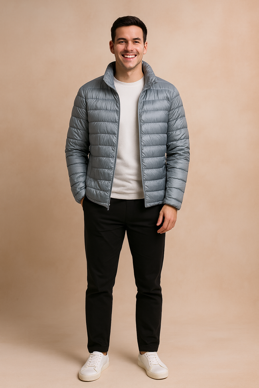 Light gray puffer jacket with horizontal quilted design and front zipper, styled with a white t-shirt, black trousers, and white sneakers.