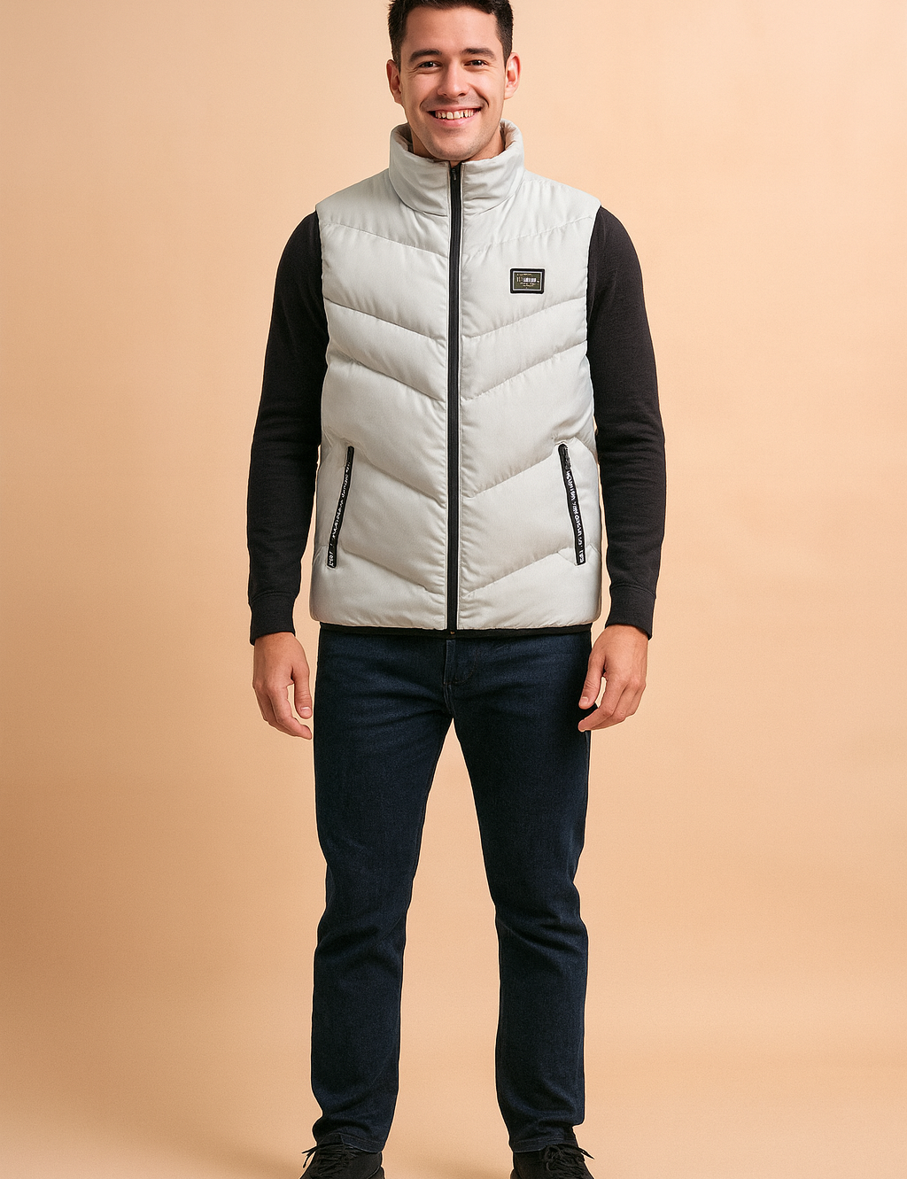 Light grey sleeveless puffer vest with black zipper details, lightweight quilted design, and modern stand-up collar for casual winter wear.