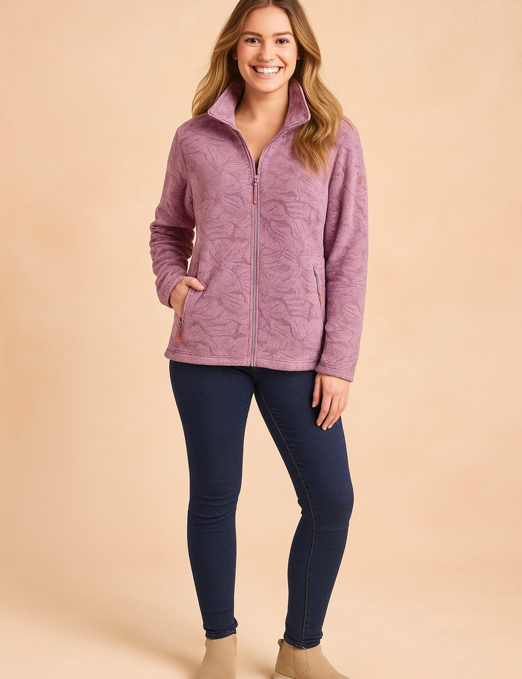 Lilac fleece jacket with embossed leaf pattern, full zip closure, and side zip pockets