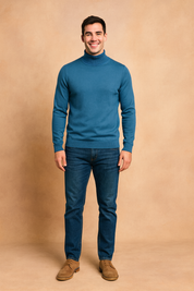 Stylish men’s blue turtleneck sweater with ribbed cuffs and hem, offering a modern slim fit and clean design. Perfect for smart-casual outfits, this sweater adds sophistication and comfort to any look.