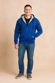 Men's casual winter hoodie in royal blue with cream fleece lining, full zip closure, adjustable drawstring hood, and ribbed cuffs, designed for comfort and warmth.